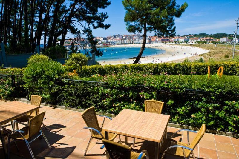 Imagen de alojamiento Inffinit Sanxenxo Playa Imagen de alojamiento Inffinit Sanxenxo Playa