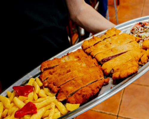 Restaurante a 2 minutos a pie de la plaza de toros El Bibio en Gijón, su especialidad son las carnes a la parrilla y los arroces.