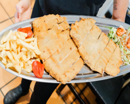 Restaurante a 2 minutos a pie de la plaza de toros El Bibio en Gijón, su especialidad son las carnes a la parrilla y los arroces.
